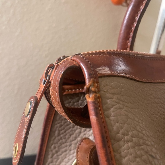 Dooney & Burke Taupe Leather Satchel w/ Cognac Handles & logo charm w/feet - Picture 3 of 6